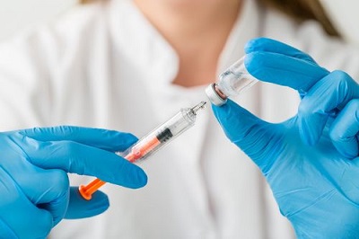 nurse getting a vaccine