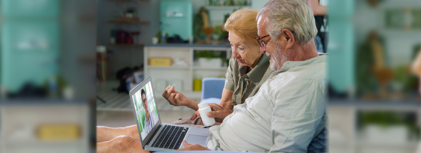 senior couple talking to a doctor online